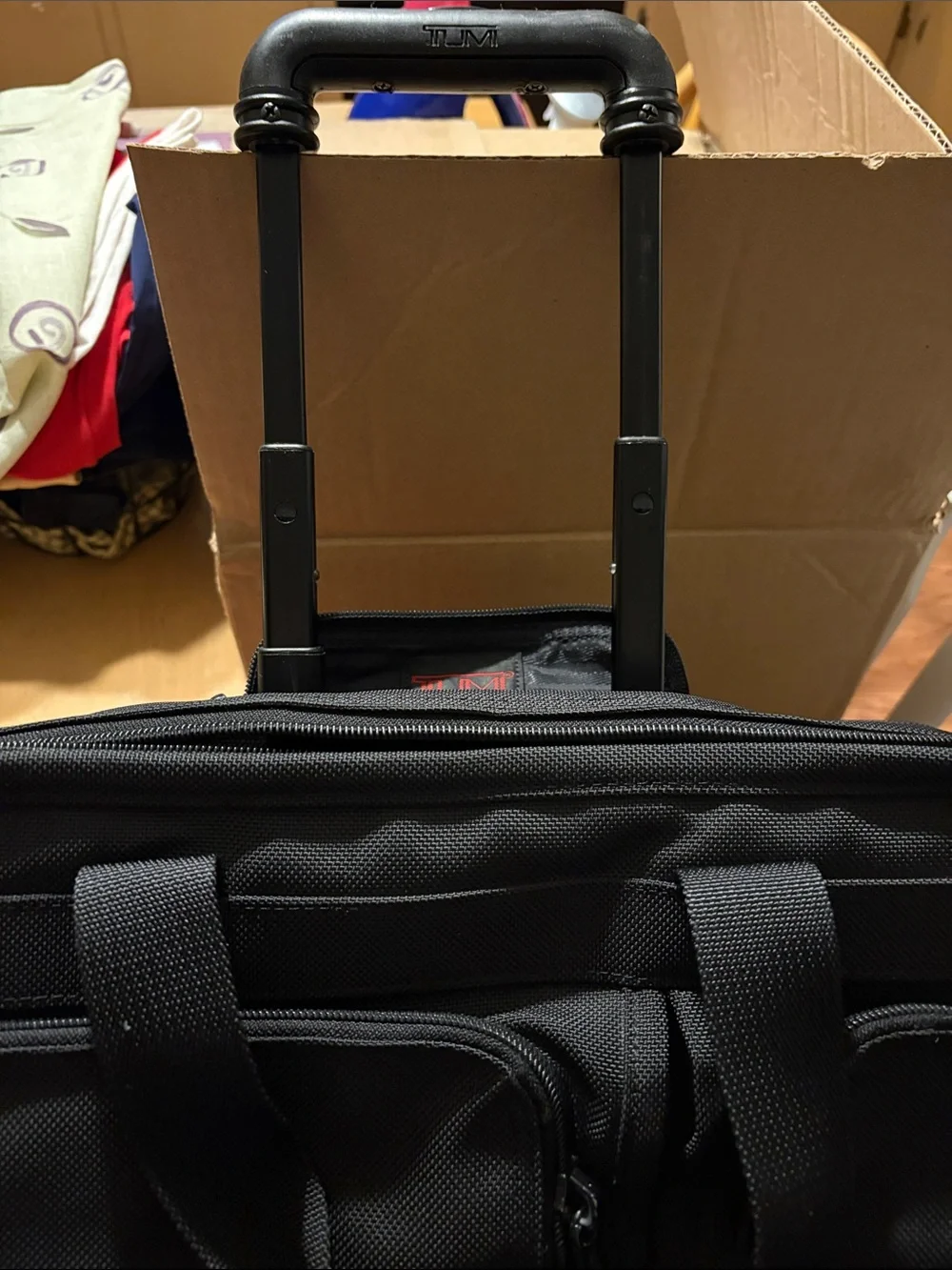 Tumi Black Rolling Travel Garment Bag with Multiple Front Pockets